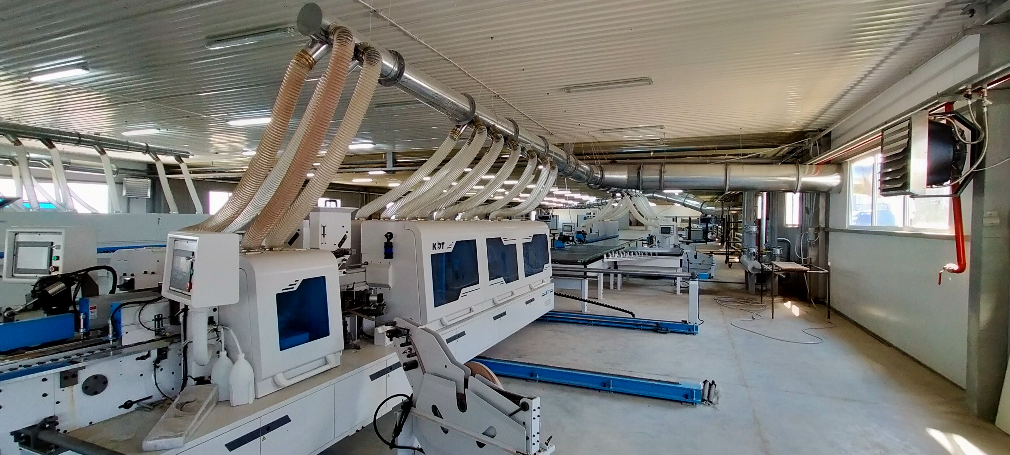 Double-sided edge banding machines